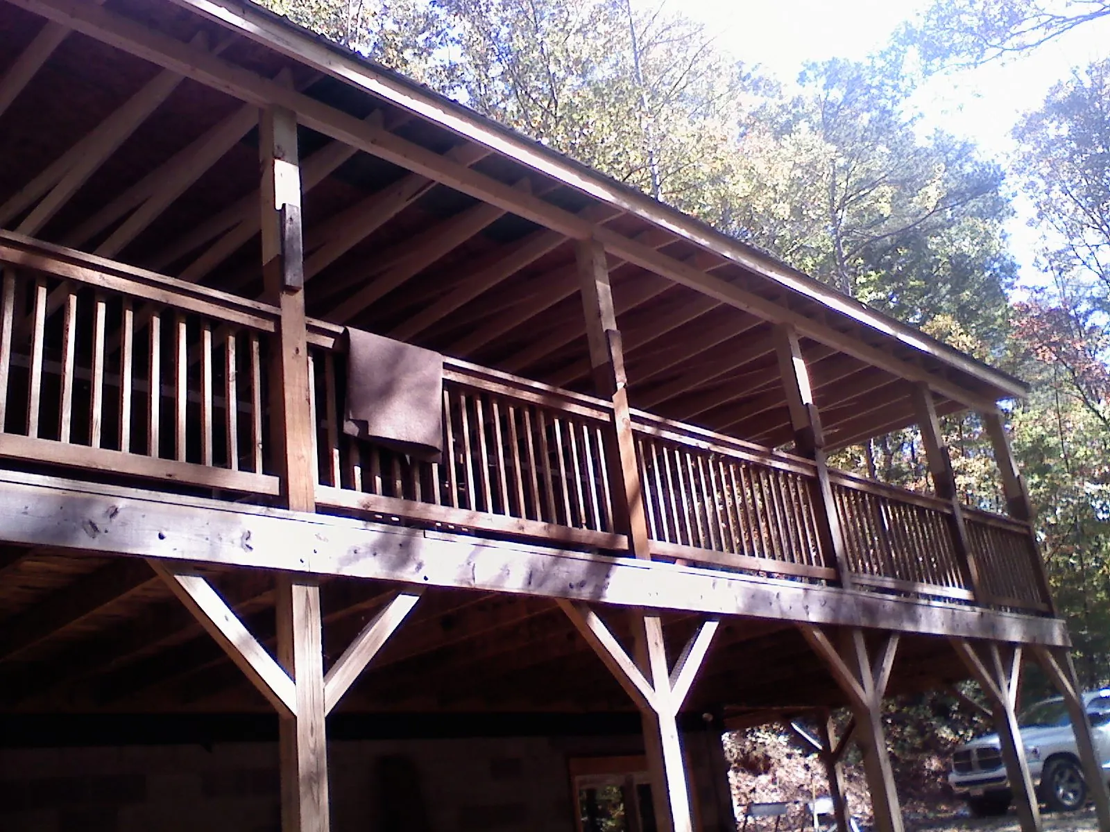 Timber framing under a new elevated porch and deck — Roof Leak Repair in Riner by Roofing Brothers